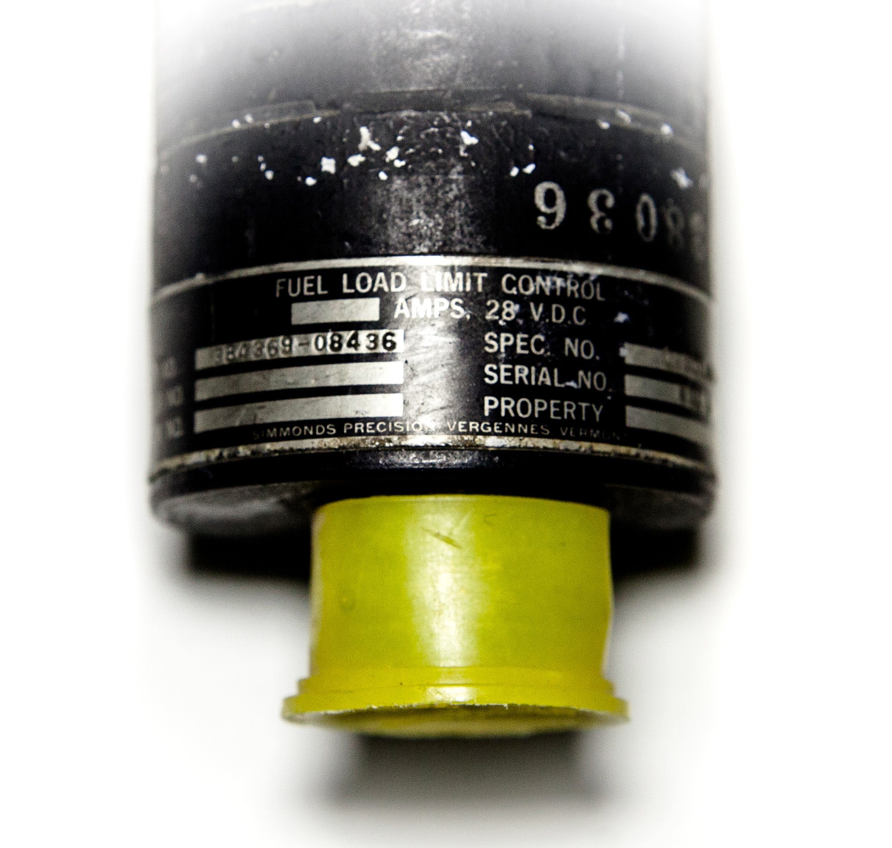 Instrument de contrôle de limite de charge de carburant Simmonds Precision, période 1970, visible avec cadran et boutons.
